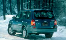 a picture of the hyundai on a snow swept road